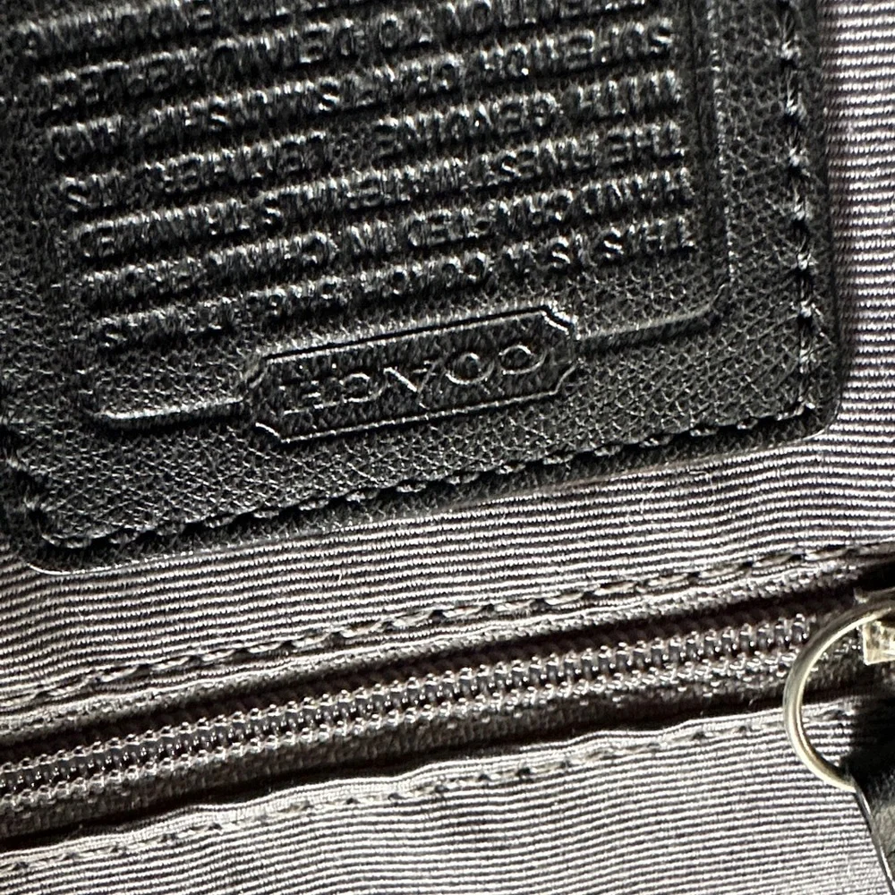 Coach sleek black